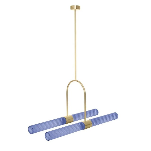 Sbarlusc pendant lamp by Luce Tu. Dimensions: 71.4 x 35-75 cm. Materials: brass and glass. State-of-the-art technology and...