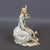 Wonderful vintage decorative sculpture, depicting a shepherdess sitting with sheep, made of fine Capodimonte porcelain,...
