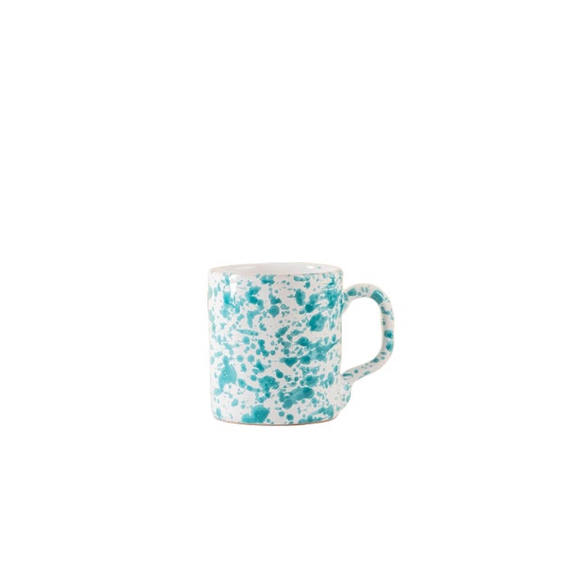 This hand-painted mug is the perfect size and the varying hues of turquoise and white in a unique pattern make this a very...