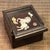 A charming Chinese round keepsake box carved from rosewood (huali wood), its lid adorned with a luminous mother-of- pearl...