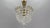 Crystal glass and brass ceiling light from circa the 1970s, Germany. Adorable and compact basket-shaped single-light...