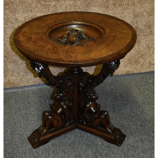 Antique (1910s) Unique Accent Table has a Renaissance Revival Style. The Wood is Walnut. Carved Wood. Craved Figural...