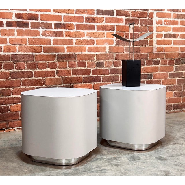 Here is a fantastic pair of vintage c.1980's light gray formica side / end tables with classic chrome plinth bases! This...