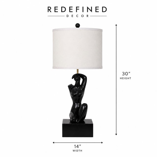 Mid-century ebonized oak figural table lamp by Yasha Heifetz, featuring Kelly Wearstler book provenance. The base is...
