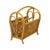 Vintage magazine rack made of bamboo and rattan, featuring a distinct bohemian style; Netherlands, circa 1980s. This item...