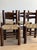 A beautifully preserved set of four original unmarked Charles Dudouyt rush chairs, showcasing the designer’s signature...