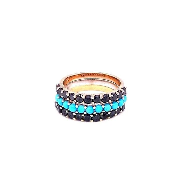 This set of bands has Round Cut Black Diamonds that weigh approximately 2.00 Carats and Round Cut Turquoise stones that...