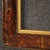 Mid-20th-century Italian frame. Carved, lacquered, gilded (bronze tint), and painted wooden piece with a faux wood finish....
