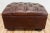 Vintage seasoned Restoration Hardware tufted leather ottoman. Features iconic and enduring style and is masterfully...