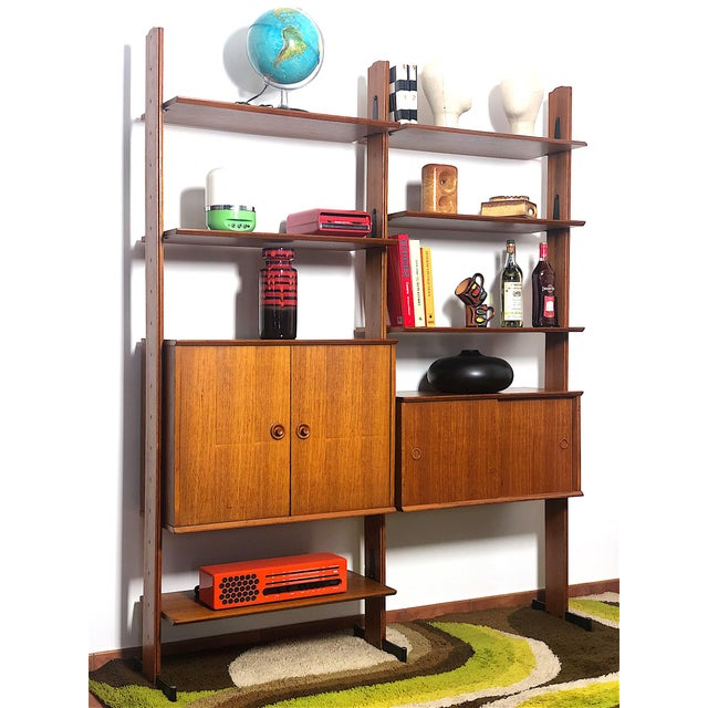 Modular double-sided bookcase with 2 bays from the 60s. The bookcase is made in Italy and has been completely restored and...