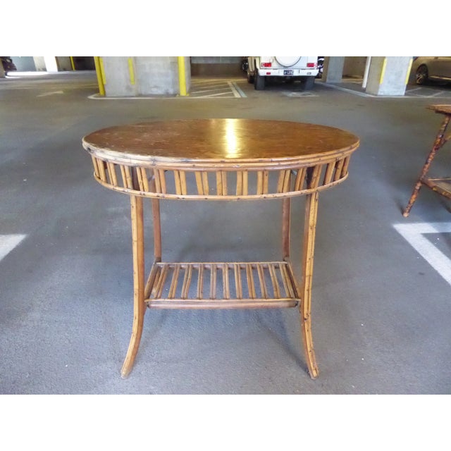 Wonderful 1920's Sculptural Oval Rattan Center Table sold as found in vantage condition showing wear to top but in good...
