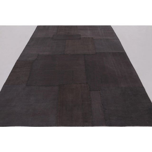 This 7x10 vintage Anatolian patchwork rug is an evocative addition to Rug & Kilim’s collection, a masterpiece of Turkish...