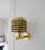 A stunning pair of wall mounted lamps with base and laminated shade in brass. Vintage condition, with wear on the brass....