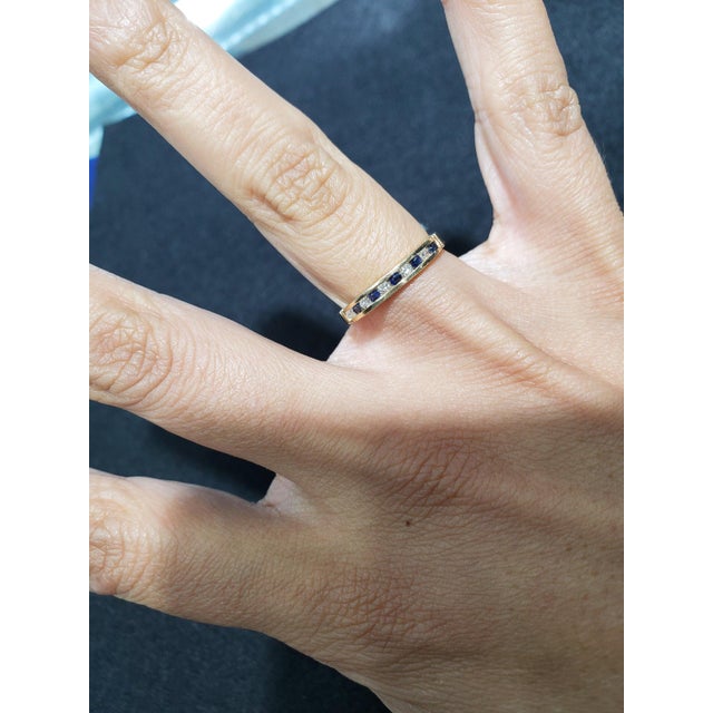 ♥ Product Summary ♥ Main Stone: Diamond & Sapphires Band Material: 14k Yellow Gold Stones: 10Band Width: 3mm Weight: 2 grams