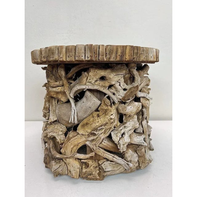 Beautiful small side table made of organic driftwood with a very calm look. The wood structure and color are very natural...