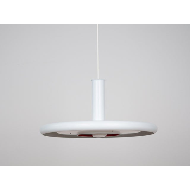 The Optima lamp was designed in 1973 by Hans Due and manufactured by the Danish company Fog og Morup. The Optima series is...