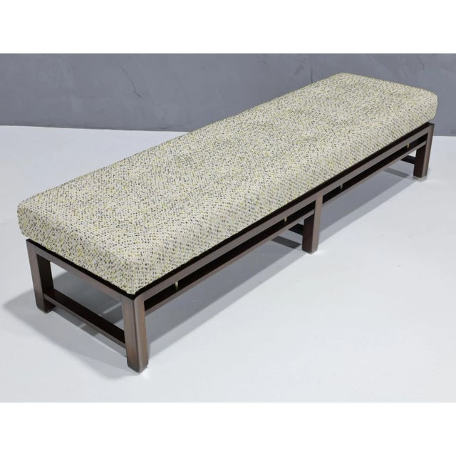 A great looking solid bench designed by Edward Wormley for Dunbar, this mahogany masterpiece exudes timeless elegance....