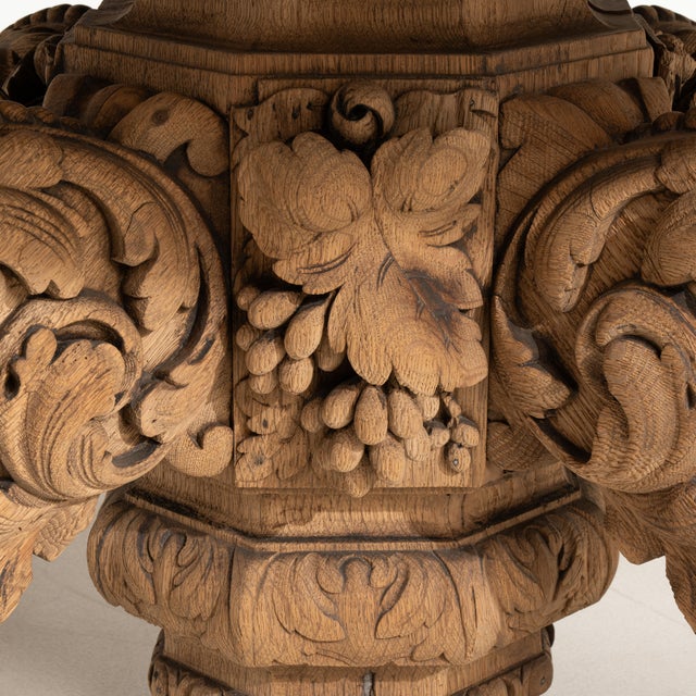 A substantial Henri II style centre table crafted in oak, showcasing the bold forms and decorative carving characteristic...