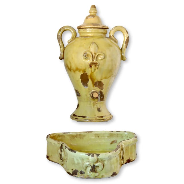 A magnificent 19th-century French ceramic lavabo, beautifully hand-crafted and adorned with fleur-de-lis motifs. Once used...
