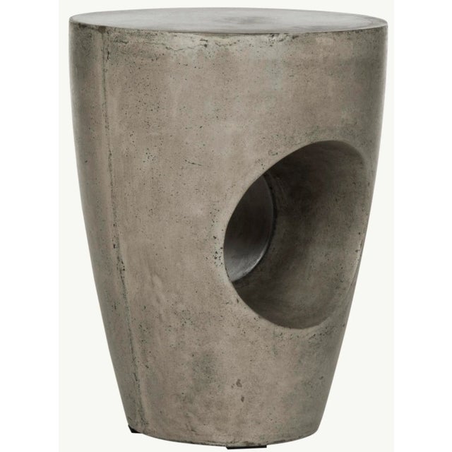 Inspired by the African influence present in the legendary work of modernist sculptors, this contemporary concrete accent...