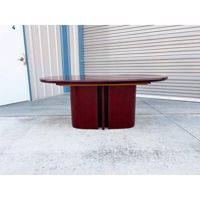 Danish Modern Rosewood Oval Dining Table by Skovby Møbelfabrik This stunning Danish Modern dining table was expertly...