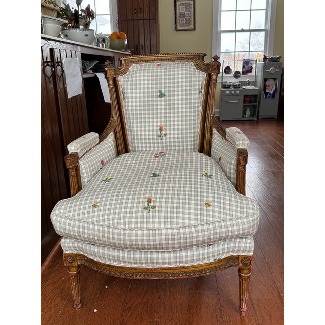 Elegant late 19th-century French Louis XV-style giltwood bergère, newly priced to sell and well-suited for both...