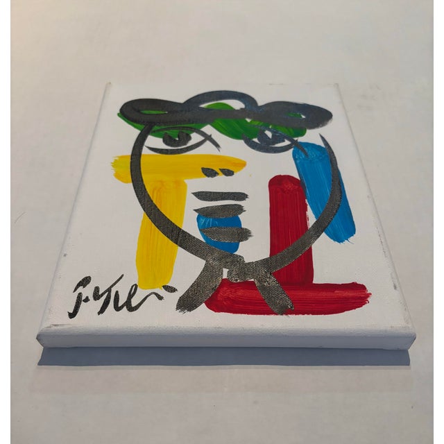 Abstract Geometric Portrait Painting on Canvas. Peter Robert Keil, a German artist born in 1942, has led a life immersed...