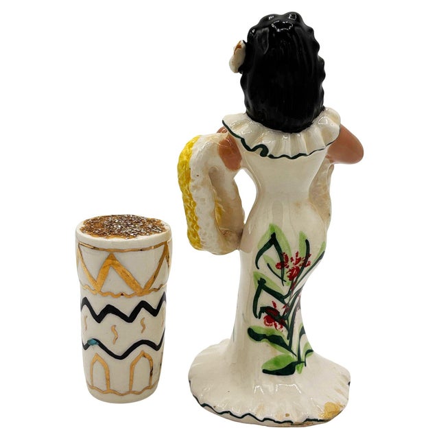 Mid-century two-piece ceramic set captures the mid-century Polynesian Pop aesthetic. It features a graceful performer in a...