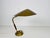 An italian table lamp made in the 1960s. The lighting has an exceptional design which is similar to the table lamps made...