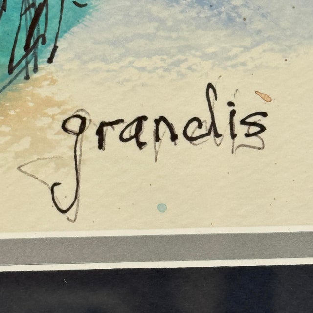 A signed original watercolor and ink painting by Barbara Grandis, presented in an elegant gilt frame with a deep navy mat....