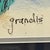A signed original watercolor and ink painting by Barbara Grandis, presented in an elegant gilt frame with a deep navy mat....