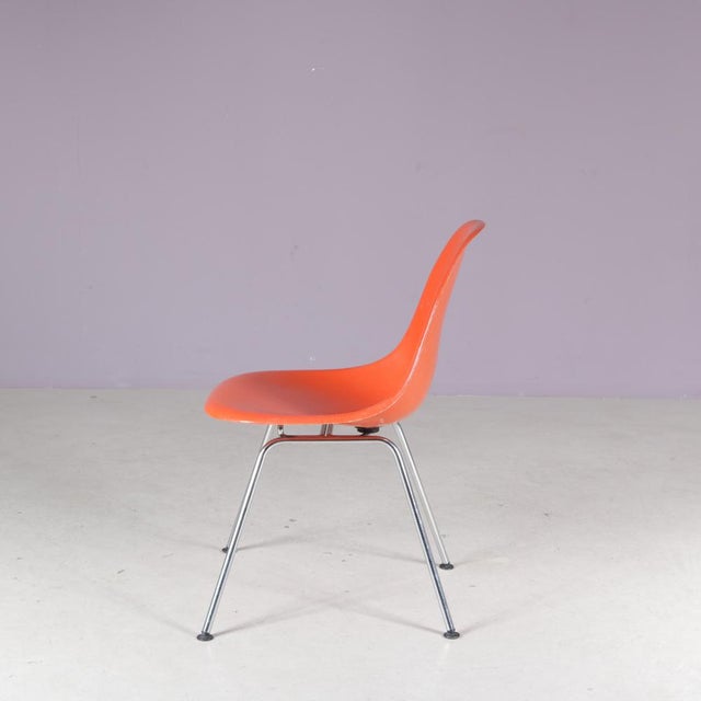 Dining Chair in Orange Fiberglass by Charles & Ray Eames for Herman Miller, USA, 1960s, in Good conditions. Designed 1960...