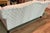 18th Century English 79” Camelback Sofa replica. Recently reupholstered in this neutral fabric. The sofa has a tight...