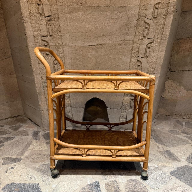 For your consideration, a vintage bamboo and rattan bar cart (or serving trolley), typically found in coastal, bohemian,...