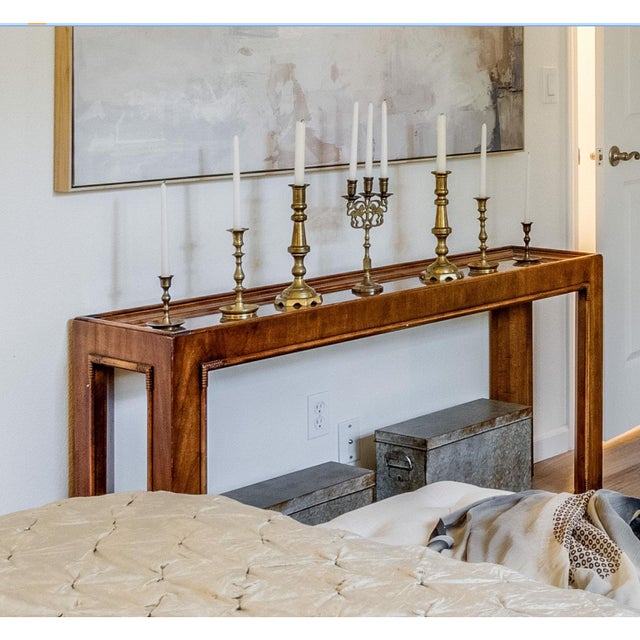 A vintage Drexel Heritage Captiva console table that exemplifies the relaxed sophistication of 1970s American design....