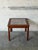 This square side end table features an inset ceramic tile top decorated with a detailed floral motif. Straight wooden legs...