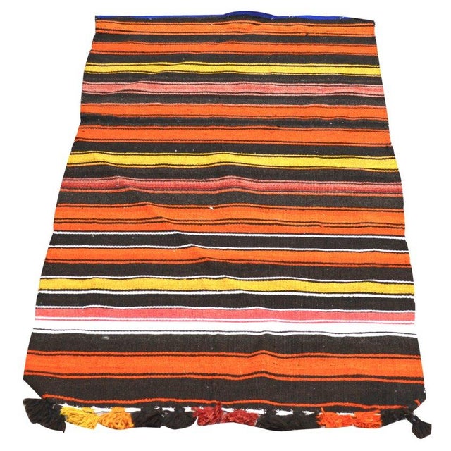 Hand-knotted with care using traditional rug-making techniques, this wool rug blends timeless craftsmanship with a modern...