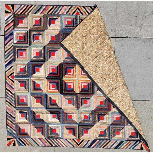 19Thc Wool & velvet log cabin quilt with striped border and unusual corner blocks.The back has a interesting corner...