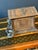 This cigar box is crafted in the form of a rustic wooden chalet, with detailed carvings that mimic wooden planks and...