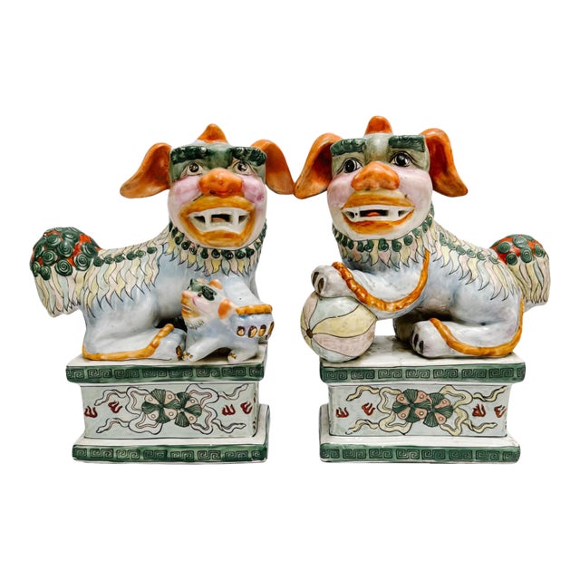 Mid 20th Century Chinese Famille Verte Style Glazed Ceramic Foo Dogs - A Pair For Sale