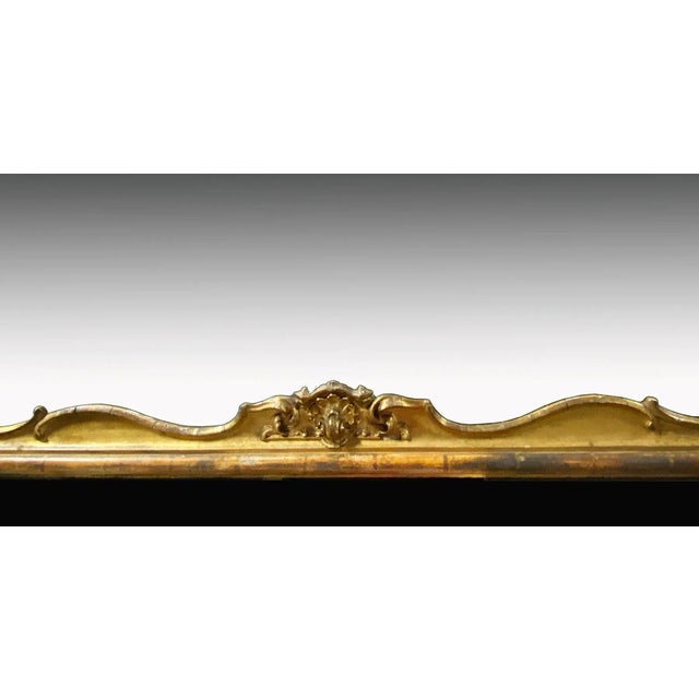 Victorian era gilt pier mirror. The gilt surface is somewhat distressed in areas with some missing pieces (See 'condition'...
