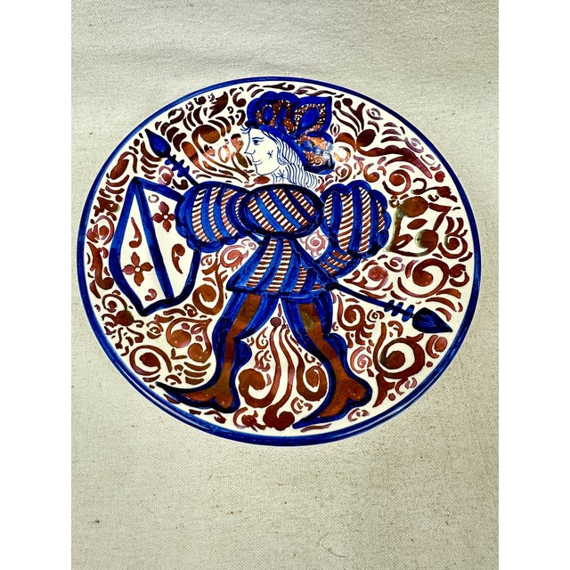 Two vintage hand painted lusterware plates signed Taner from Manises, a town near Valencia, Spain that is known for its...