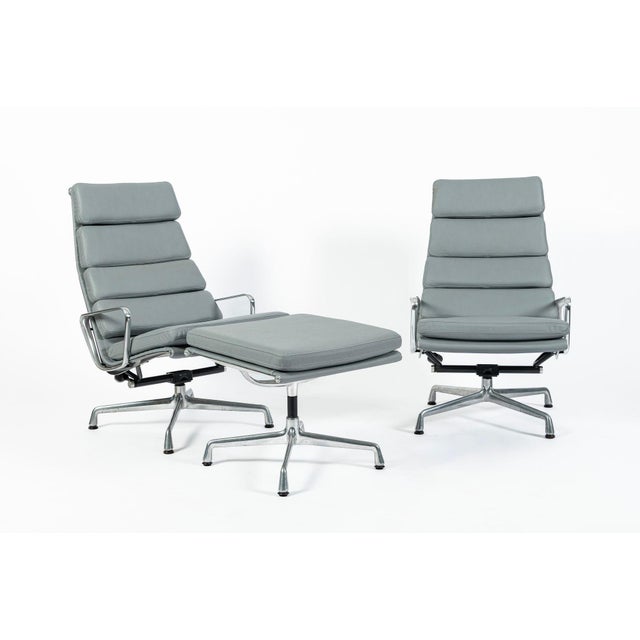 This pair of authentic Eames for Herman Miller Aluminum Group Soft Pad Recliners and Soft Pad Ottoman was manufactured in...