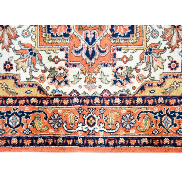 A wonderful mid-20th century Persian Ardabil rug with a large central floral medallion living amidst even more large...