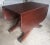 A 1950s George III Style Mahogany Drop Leaf Dining Table by iconic Georgetown Galleries. Features 4 pedestals all on...