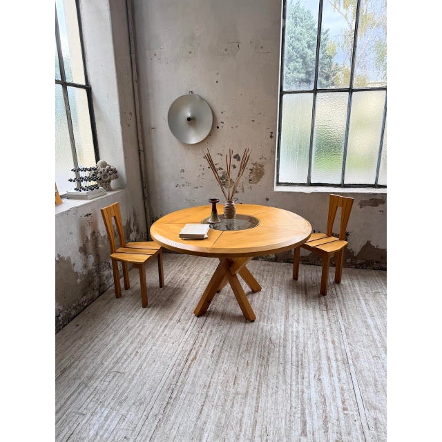 Antique round table with a cross base by Seiltz, a French cabinetmaker. We love its design, inspired by Pierre Chapo's T21...