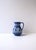 A beautiful cobalt blue and white Jasperware pitcher, with Greek-Key boarders, in the Neoclassical design style, by...