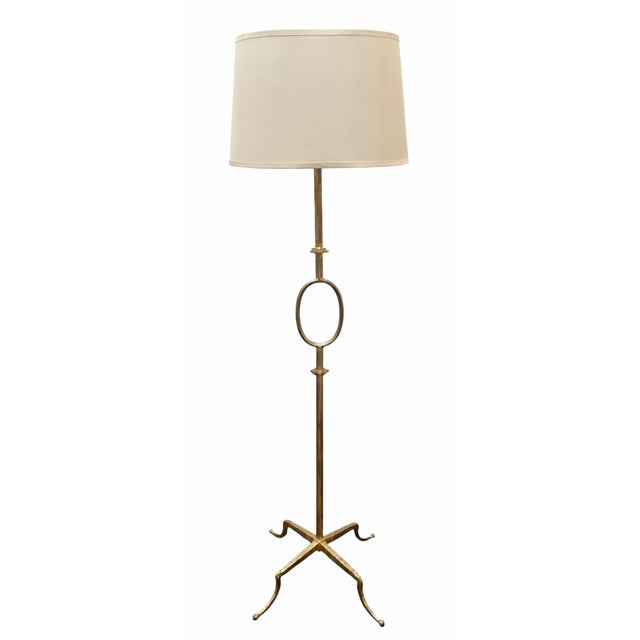 Vintage Poillerat Style Gilt Wrought Iron Oval Floor Lamp. Features 22k gilding and dual adjustable light cluster.