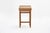 Made from oak with a slanted writing surface and brass hinges, the top opens up to reveal different storage compartments...