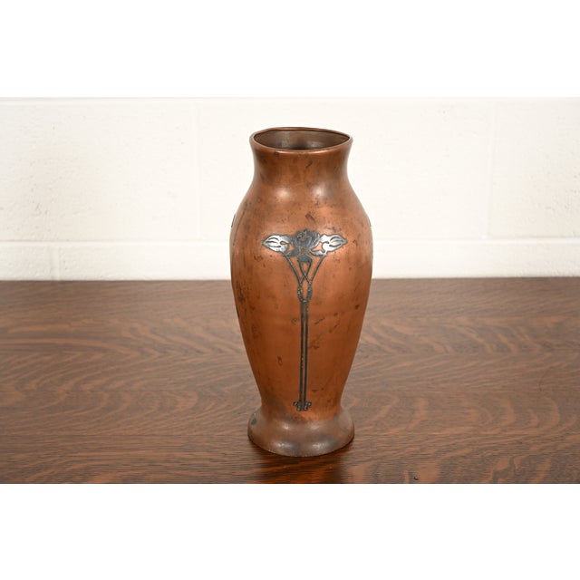 A beautiful Arts & Crafts period sterling silver on bronze large vase with floral motif By Silver Crest (the mark of Smith...
